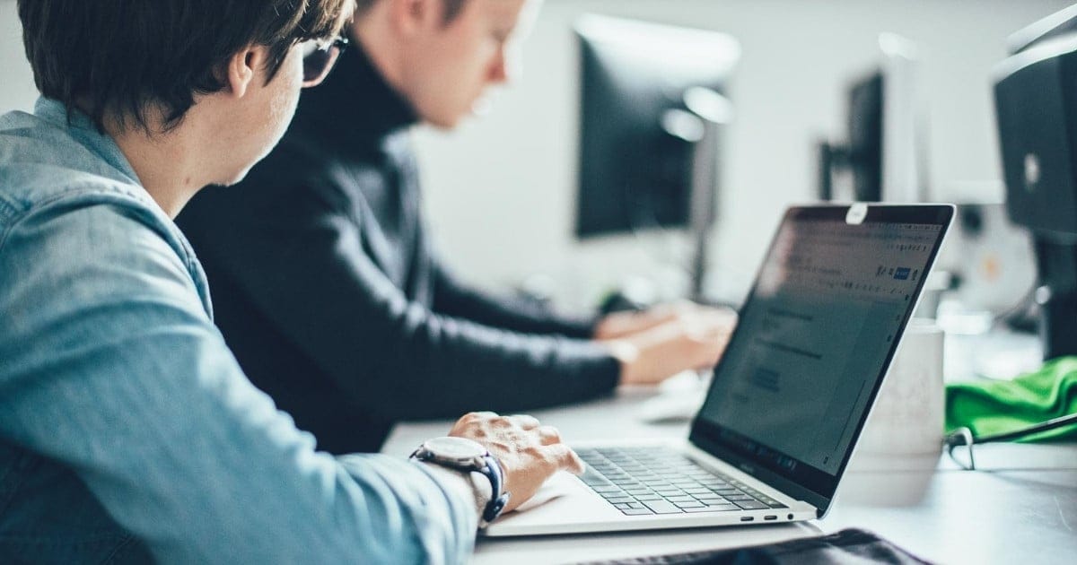 Fintech development team working in modern office